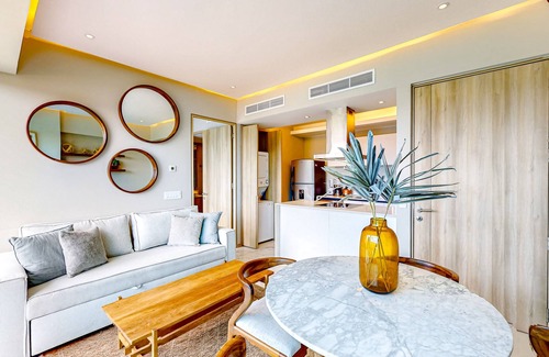 Flamingos Condo | Updated condo with sweeping views, pools, fitness room, balcony, W/D, and AC