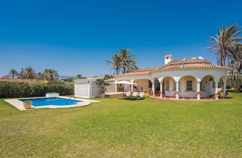 Urbanizacion Marbessa Villa | 1100 Stunning Marbesa Beachfront Villa with Garden Pool