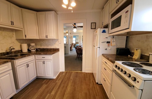 Lakeside Cottage | 608 Lakefront Beautiful Lakefront Cottage Right on the Lake Path!