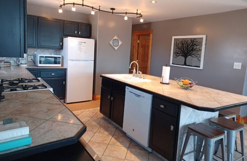 Monticello House | Alexander’s Landing Penthouse - Lakefront, Balcony, and Room to Relax