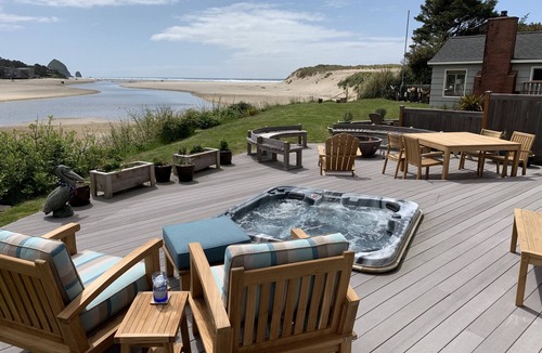 Cannon Beach House | Amazing estuary and ocean views! Relax on the deck with the fire-pit & jacuzzi