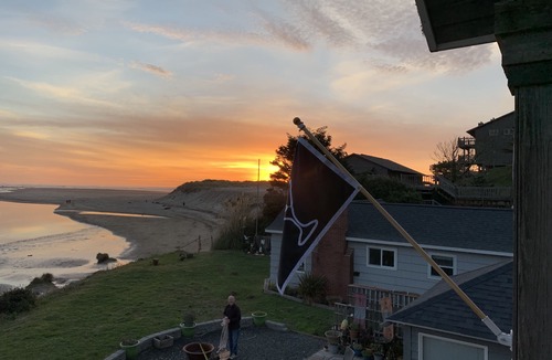 Cannon Beach House | Amazing estuary and ocean views! Relax on the deck with the fire-pit & jacuzzi
