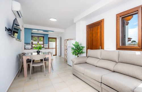 Cala d'Or Apartment | Apartment La Perla de Cala d'Or 10 with Shared Pool, Garden & Wi-Fi