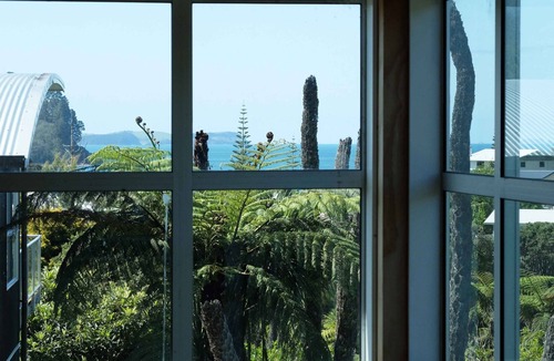 Onemana House | Architecturally designed bach in a quiet cul de sac overlooking a bush reserve