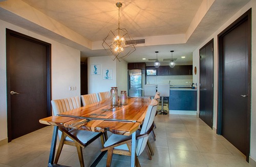 South Hotel Zone Condo | Balcony, Pools, Gym, Restaurant | Beachfront 2BR