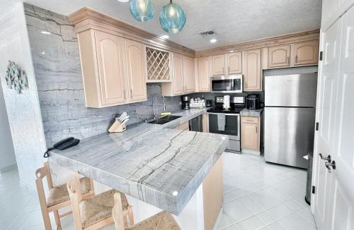 Sandy Beach Apartment | Beachfront Condo on Sandy Beach, Las Palmas Resort, 24hrs Security, Free Parking, Free Wi-Fi