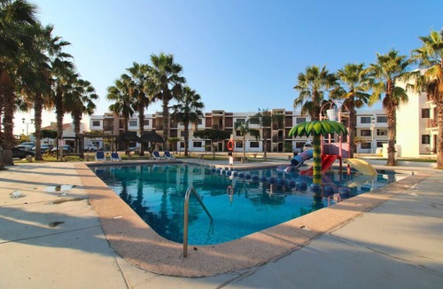 Cerritos Apartment | Beautiful family pool, close to the beach by Gpsrentas