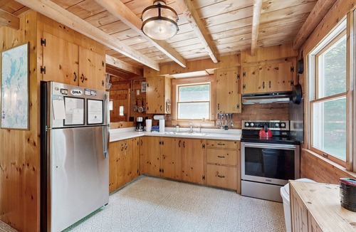Beaver Cove Cabin | Beautiful home with WiFi, lake view, deck, & firepit - walk to beach