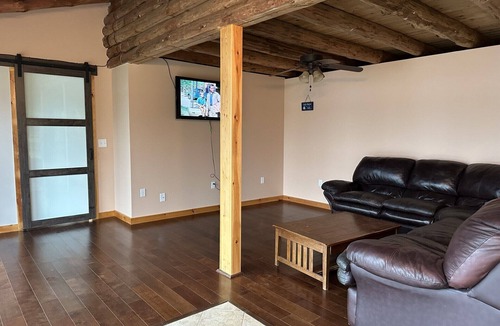 Ellsworth House | Beautiful private beach area within steps from the modern updated log home