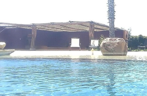 El Tezal Apartment | BRAND NEW HUGE STUDIO 2 FULL BEDS FURNISHED WITH POOL 1 BLOCK FROM THE BEACH