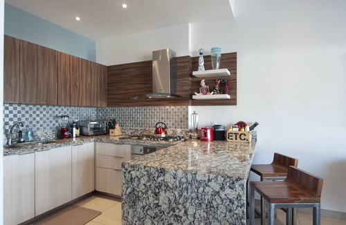 Emiliano Zapata Condo | BRAND NEW LUXURY CONDOMINIUM THREE BLOCKS FROM THE BEACH.