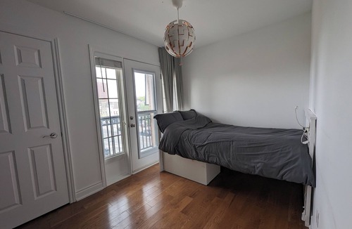 The Danforth House | Bright spacious rooms on the Danforth.