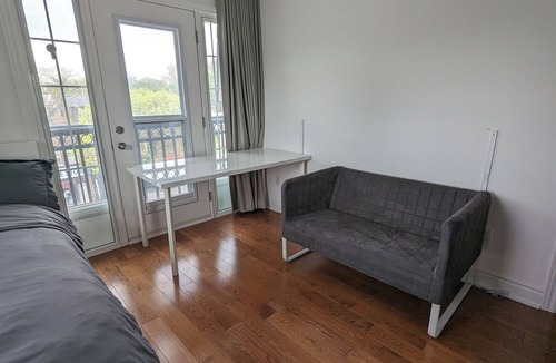 The Danforth House | Bright spacious rooms on the Danforth.