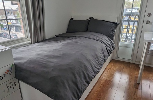 The Danforth House | Bright spacious rooms on the Danforth.