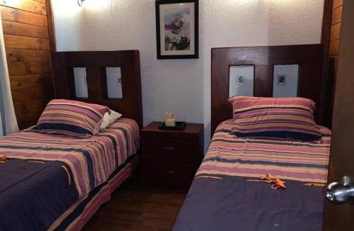 La Laguna Ski Chalet | Cabaña de las Flores. Magia en la laguna