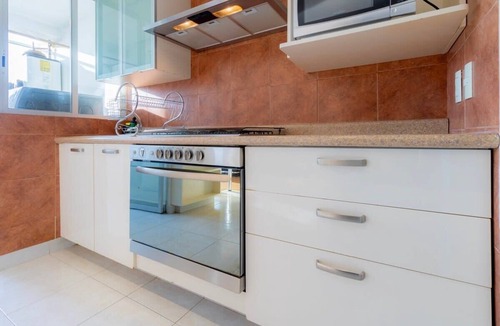 El Yaqui Condo | Capitalia - Chic Renovated w/Garden