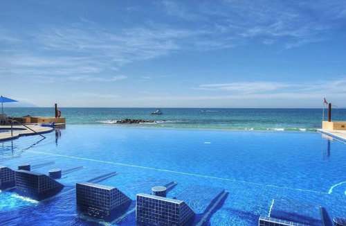 South Shore Hotel Area Condo | Casa Cielo Palmares - Beautiful beachfront 2-bedroom condo in Puerto Vallarta