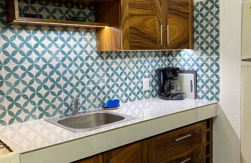 North Hotel Zone Condo | Charming Mexican Style Condo, across the street to the beach!