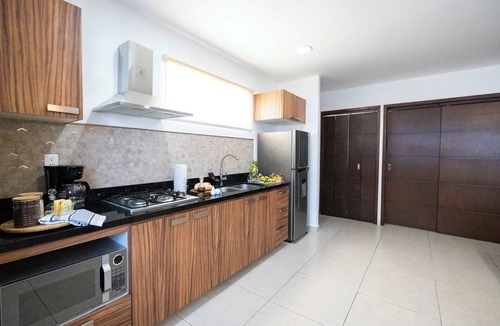 Diaz Ordaz Apartment | Cheerful Condo, Mountainview Roof and Lounge
