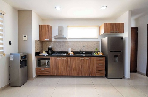 Diaz Ordaz Apartment | Cheerful Condo, Mountainview Roof and Lounge