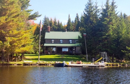 Piopolis Ski Chalet | Classic Canadian Log home on a private lake, with acres to explore!