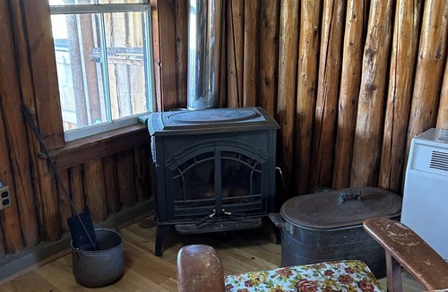 Columbia Cabin | Classic original cedar log cabins set on Simms Stream in the North East Kingdom.