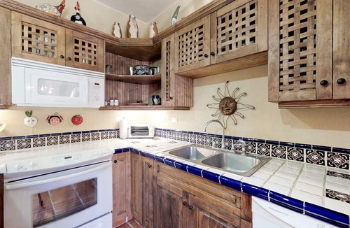 Nopolo House | Coastal retreat with sweeping ocean views, a huge patio, AC, WiFi & shared pool