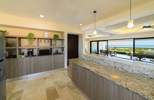 Miramar Apartment | Contemporary beachfront apartment with pool, gym, ocean views, and balcony space