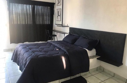 Downtown Cabo San Lucas Apartment | Cozy Black and White Studio