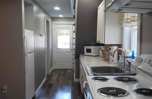 Fort Kent Mills House | Cozy home 300 ft from snowmobileATV trails. Walking distance to town & ski tow