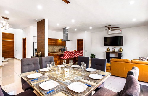 Fluvial Vallarta House | Dazzling estate with a pool, rooftop balcony, four-bedrooms, washer/dryer, & AC
