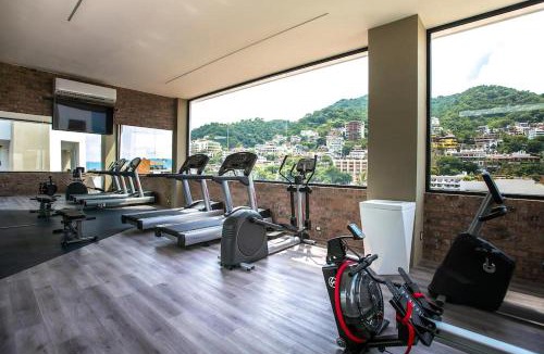 Emiliano Zapata House | Dedicated workspace, Pool, Gym | Romantic Zone 2BR