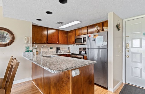 Gatlinburg - Pigeon Forge Condo | Deer Ridge E108 | Balcony, Resort Pools, Tennis + Picnic Area