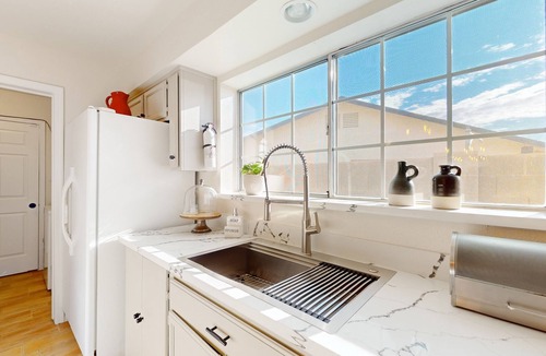 Yuma House | Delightful dog-friendly retreat with pool, yard, patio, & games - near golf