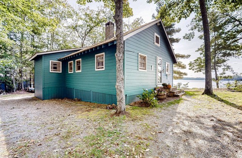 Ellsworth Cabin | Dog-friendly beach home on Green Lake with views, fireplace, dock, canoe & kayak