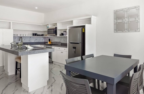 La Paloma House | Dog-friendly home 3 rows to beach with rooftop deck, pool, & kitchen