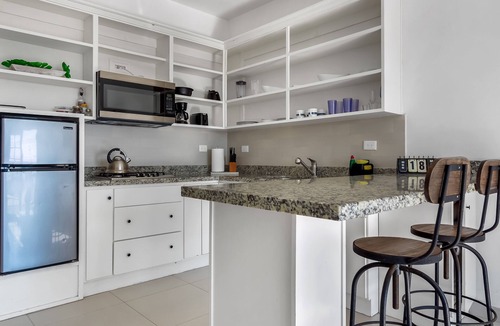 La Paloma House | Dog-friendly suite with kitchenette, heated outdoor pool, hot tub, private patio