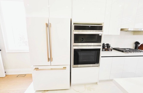 Woodbine Gardens House | Elegant Luxury Home with Open Living Space | Prime Toronto Location