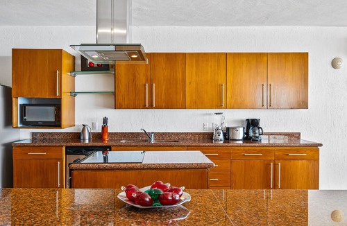 Conchas Chinas House | Elegant oceanview penthouse with private rooftop jacuzzi, pools & spa access