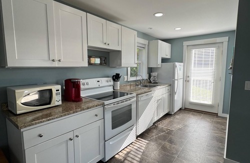 Mid-Coast and Islands House | Enjoy spectacular sunset and water views from the deck and balconies with water access.