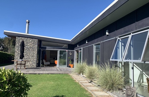 Whiritoa House | Family Friendly Modern Bach with Decks & Outdoor Fire, 200m from Beach/Surf Club