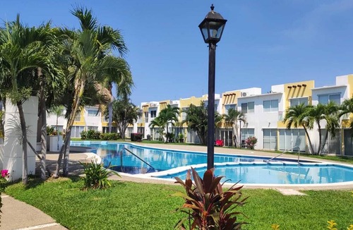 Diamante House | Family house, close to the beach, stores and the airport.