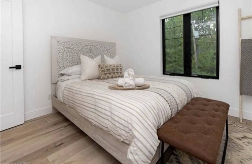 Big Bay House | Farmhouse chic on Georgian Bluffs, where luxury meets comfort.