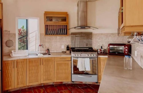 Compostela House | Find tranquility and escape tourism in this hillside home close to beaches