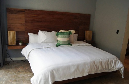 Barrio de Santiago Hotel | Habitación de lujo con king Size en el centro de Mérida.