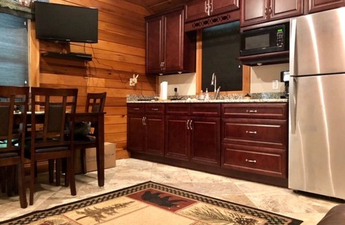 Bastian House | Hawk's Nest Mountaintop House retreat with trails to waterfall