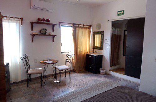 La Ribera Bed & Breakfast | HdP: Room #3 Library with one queen size bed and one sofa bed in separate room