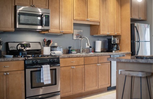 Traverse City Condo | Historic Top-Floor Condo in Downtown Traverse City – Walk to Beaches & Dining