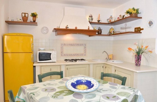 Capoliveri Apartment | House Iolanda garden and private parking 5 minutes from downtown and beaches