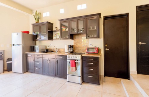 Cerritos Condo | Just steps from the Beach; Panoramic ocean views from private rooftop balcony!
